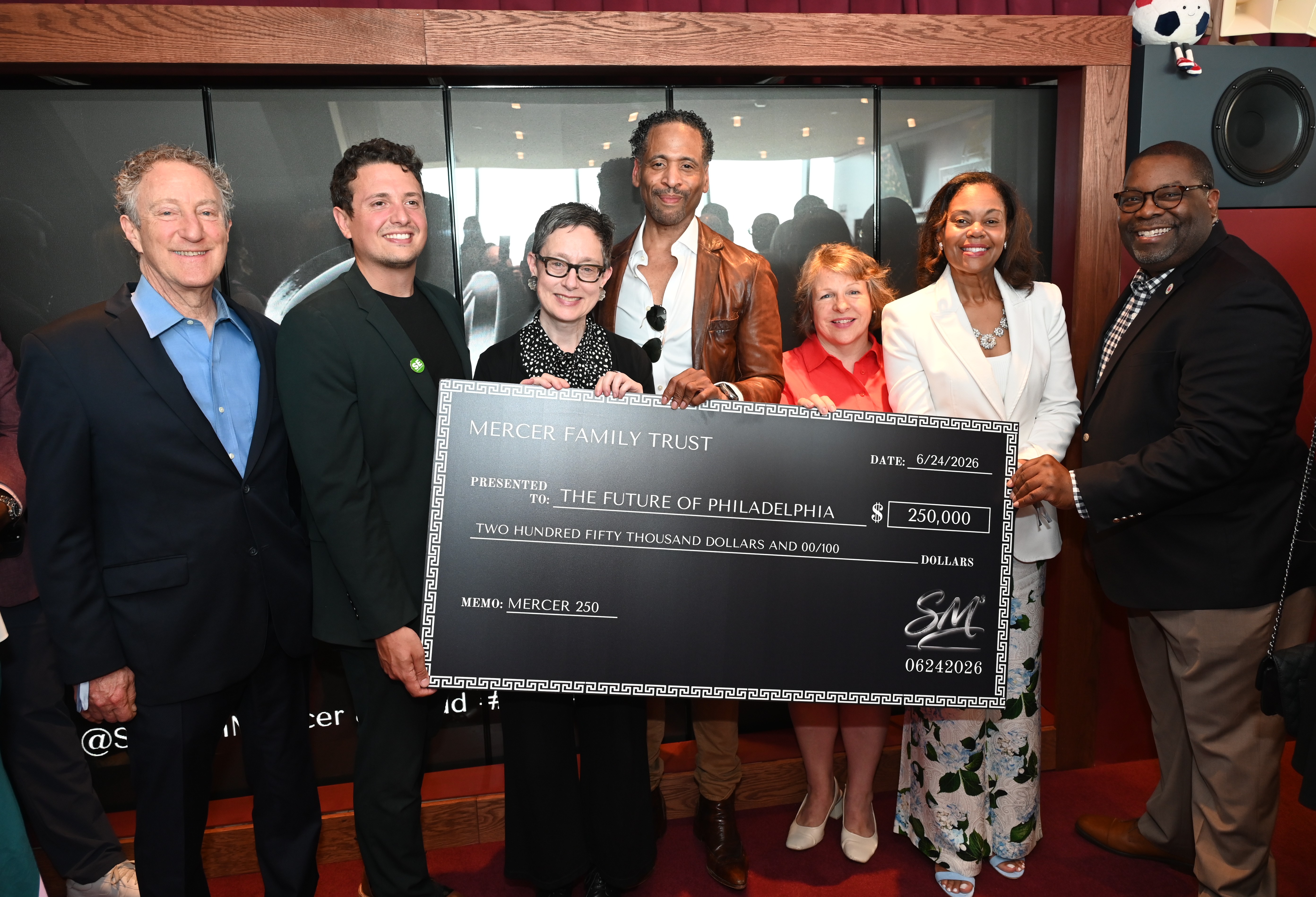 Shelton Mercer III presents a check launching the MERCER 250 Outcomes & Innovation Fund, an initial $250,000 investment through the Mercer Family Trust to drive community impact and innovation across Philadelphia. / Source: Shelton Mercer III (EZ Newswire)
