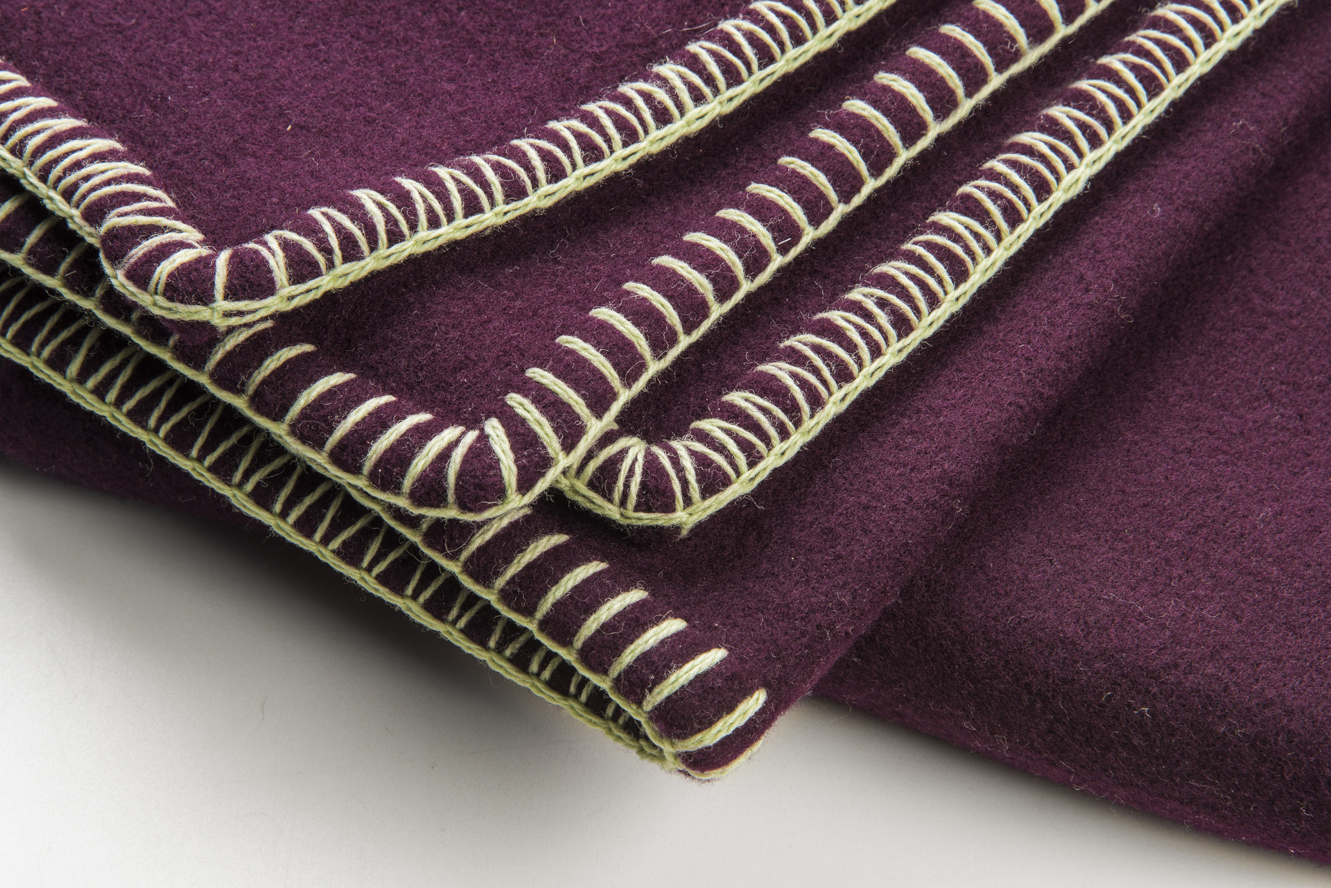 Rioja Holistic Home premium blanket in Plum with a custom green trim. / Source: Rioja Holistic Home (EZ Newswire)